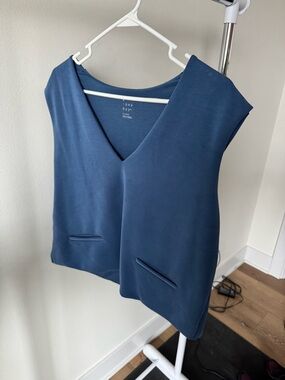 Women’s blue sleeveless V-neck top by A New Day size XL - new with tags